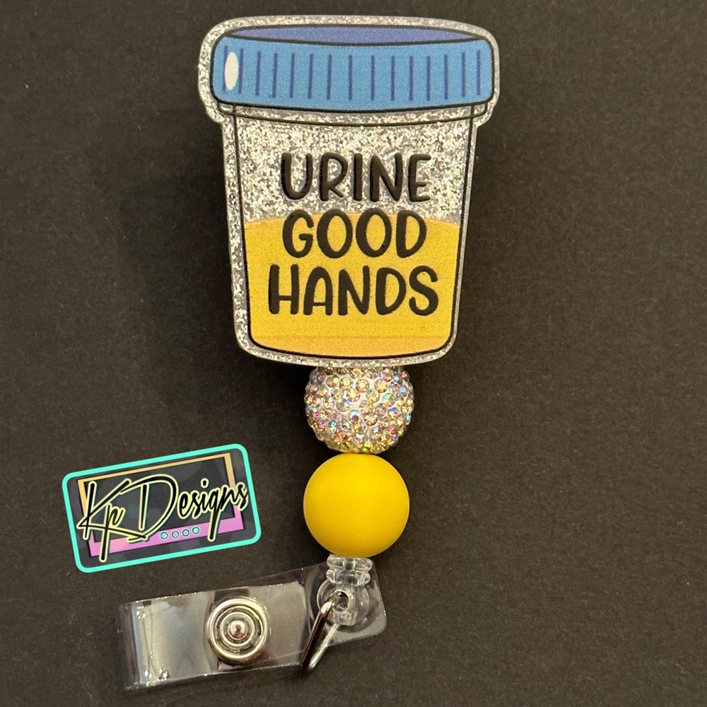 Urine Good Hands badge reel